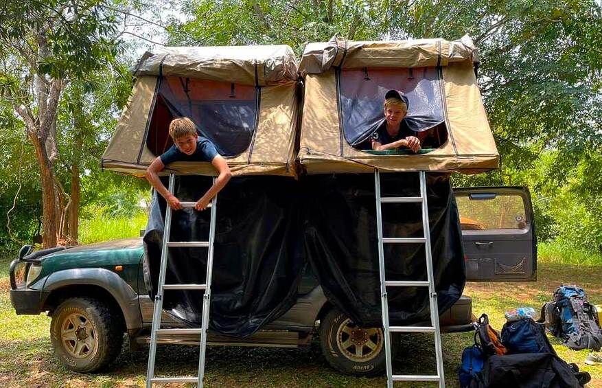 land cruiser tx rental east africa with a rooftop tent
